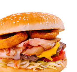 Delicious bacon and onion rings cheeseburger isolated on white