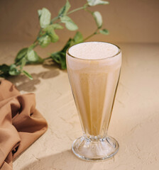 Refreshing milkshake in elegant glass