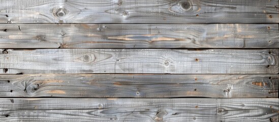 Obraz premium Top view of a weathered wooden background with a light gray color and rustic texture, perfect for a copy space image.