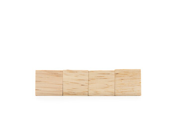 Four blank wooden blocks isolated on white background. Empty wooden cubes for text. Copy space and Clipping Path