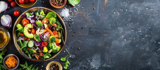 Salad made with a variety of fresh ingredients on rustic tableware. Background of food with copy space image.