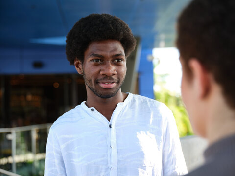 Man having a conversation outside