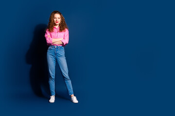 Full body portrait of pretty young lady crossed arms wear shirt isolated on dark blue color background