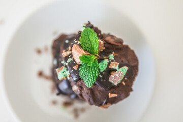 Homemade delicious double chocolate chip mint iced cookies, freshly baked at home with Mum and Daughter