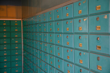 The post office building with mailboxes.