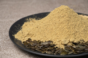 Flour from ground fresh pumpkin seeds, a superfood, a plant-based source of protein and vitamins.