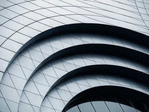 Architecture details Metal wall Curve Modern building facade Steel tiles monochrome 