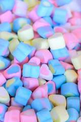 Background of pastel heart shaped marshmallows