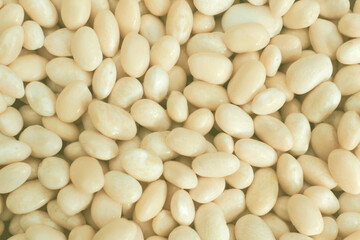 White beans, sweet candies, pebbles, backdrop