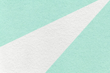 Fototapeta premium Texture of old craft white and light cyan color paper background, macro. Vintage abstract mint cardboard