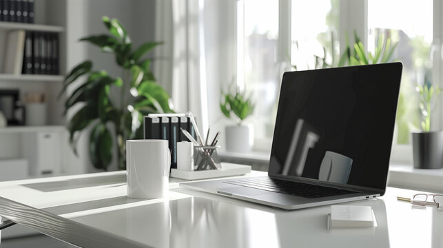 a modern workplace with a laptop computer, a cup of coffee, and office supplies on a white desk