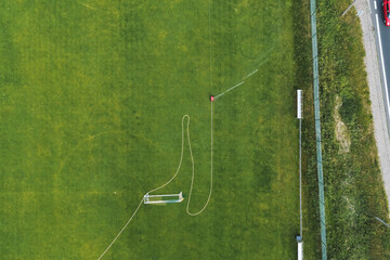 Overhead shot of soccer field with active watering system © AlexGo