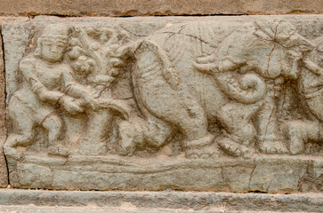 Mural sculpture on stone at Royal Enclosure. Base of Mahanavami Dibba or the Dussehra Platform. Hampi, Karnataka, India, Asia. 