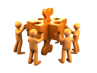 a group of people holding a puzzle piece