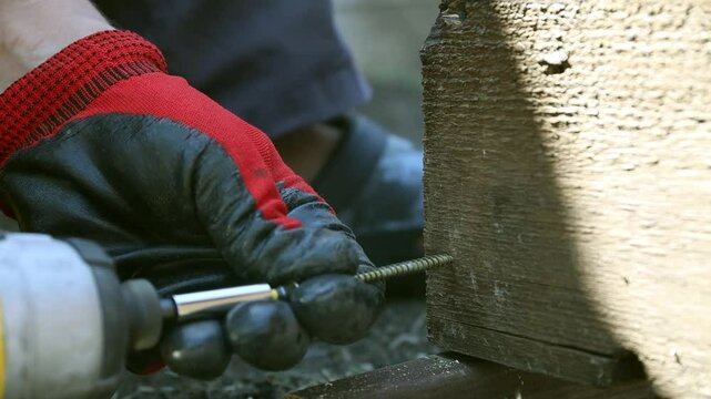 Driving a screw using an impact driver