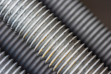 Steel bolts thread texture close-up