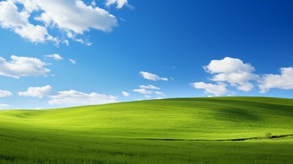 Idyllic landscape of rolling green hills under a bright blue sky with fluffy white clouds. Concept of nature, serenity, peace, and tranquility.