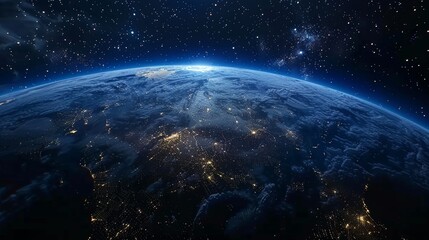 Obraz premium The dark side of Earth with illuminated landmasses and a starry sky in the background