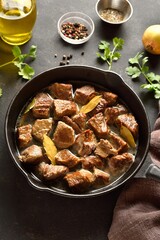 Braised beef in cast iron skillet