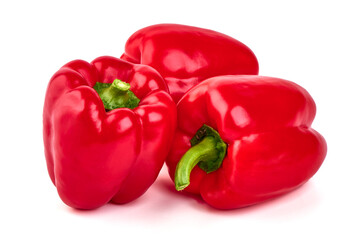 Red ripe bellpeppers, isolated on white background.