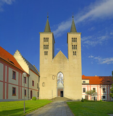 Obraz premium View of the Premonstratensian Monastery from 12th century and the Romanesque church of Annunciation of Virgin Mary in Milevsko, Czech republic