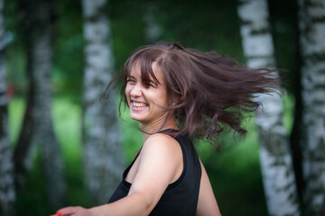 Woman in the Park Experiencing Happiness