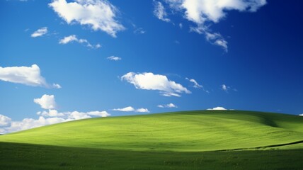 Fototapeta premium Iconic Rolling Green Hill under Blue Sky with Puffy White Clouds. Serene Landscape Background