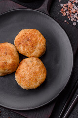 Delicious fresh fried minced fish cutlets with spices and herbs