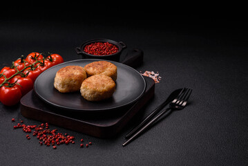 Delicious fresh fried minced fish cutlets with spices and herbs