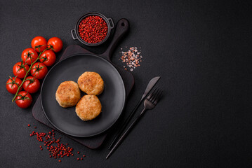 Delicious fresh fried minced fish cutlets with spices and herbs