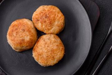 Delicious fresh fried minced fish cutlets with spices and herbs