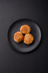 Delicious fresh fried minced fish cutlets with spices and herbs