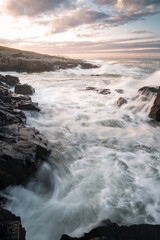 Dramatic Waves Crashing on The Rock