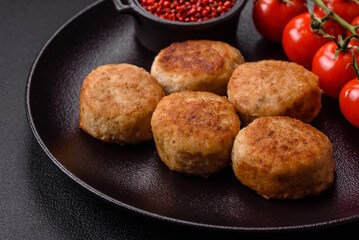 Delicious fresh fried minced fish cutlets with spices and herbs