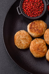 Delicious fresh fried minced fish cutlets with spices and herbs