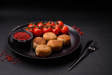 Delicious fresh fried minced fish cutlets with spices and herbs