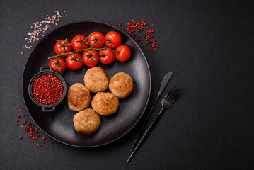Delicious fresh fried minced fish cutlets with spices and herbs