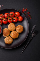 Delicious fresh fried minced fish cutlets with spices and herbs
