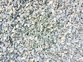 Small stone gravel texture background. Gray gravel pebbles stone texture, seamless texture