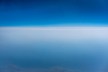 An abstract image of the sky taken from an airplane from a high angle.