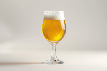 close up horizontal isolated image of a glass of beer over a white neutral background, copy space