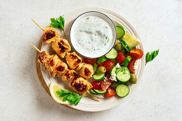 Grilled chicken kebab with vegetable salad