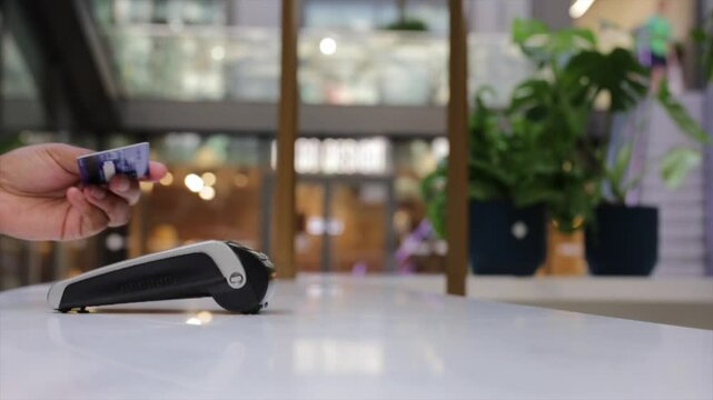 nfc contactless payment by credit card and pos terminal