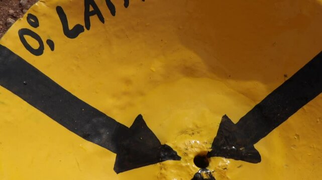 Sign indicating the equator line at 0&deg; latitude in Kampala, Uganda