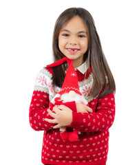 Portrait of a beautiful little girl holding a santa toy over transparent background.