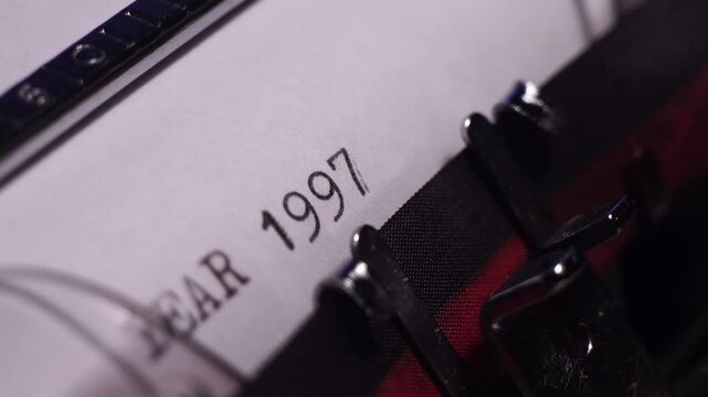 Year 1997, Typing on Blank White Paper in Vintage Typewriter, Close Up