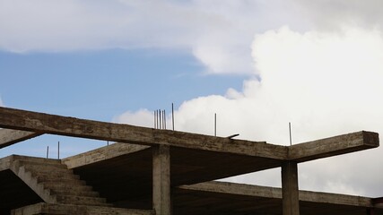 unfinished concrete structure building under construction