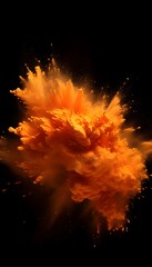 orange powder explosion on black background