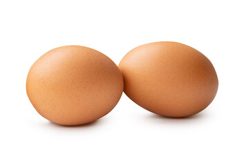 Side view of two brown chicken eggs isolated on white background with clipping path