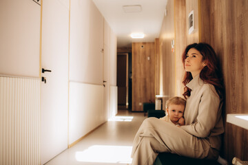 Mum and daughter waiting for a doctor's appointment